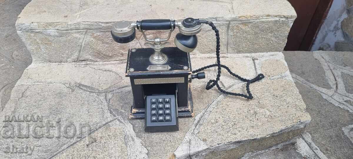 Auction  Old phone with emblem