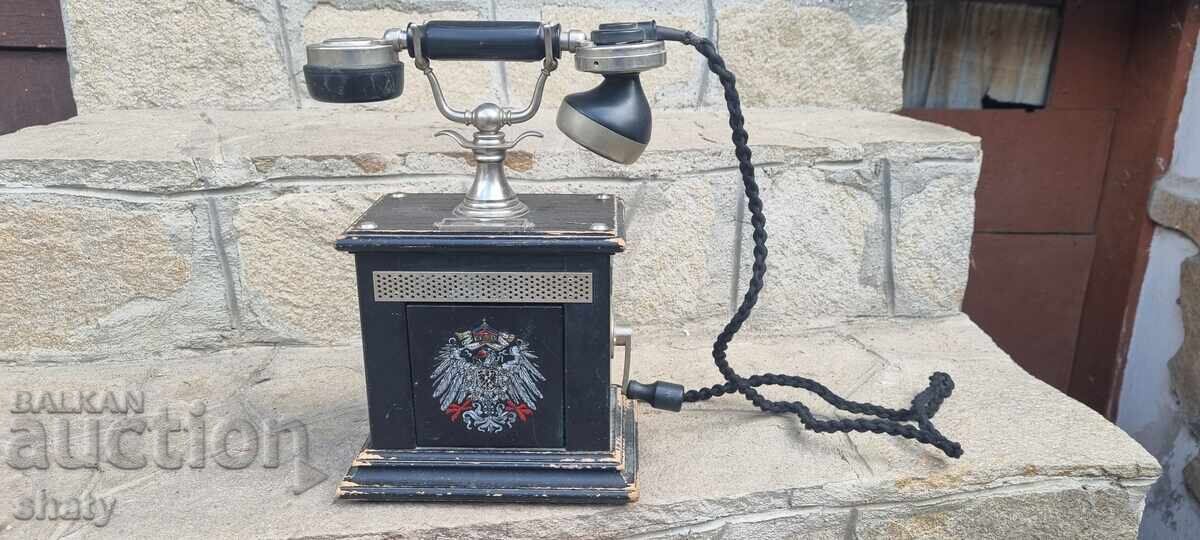 Old phone with emblem