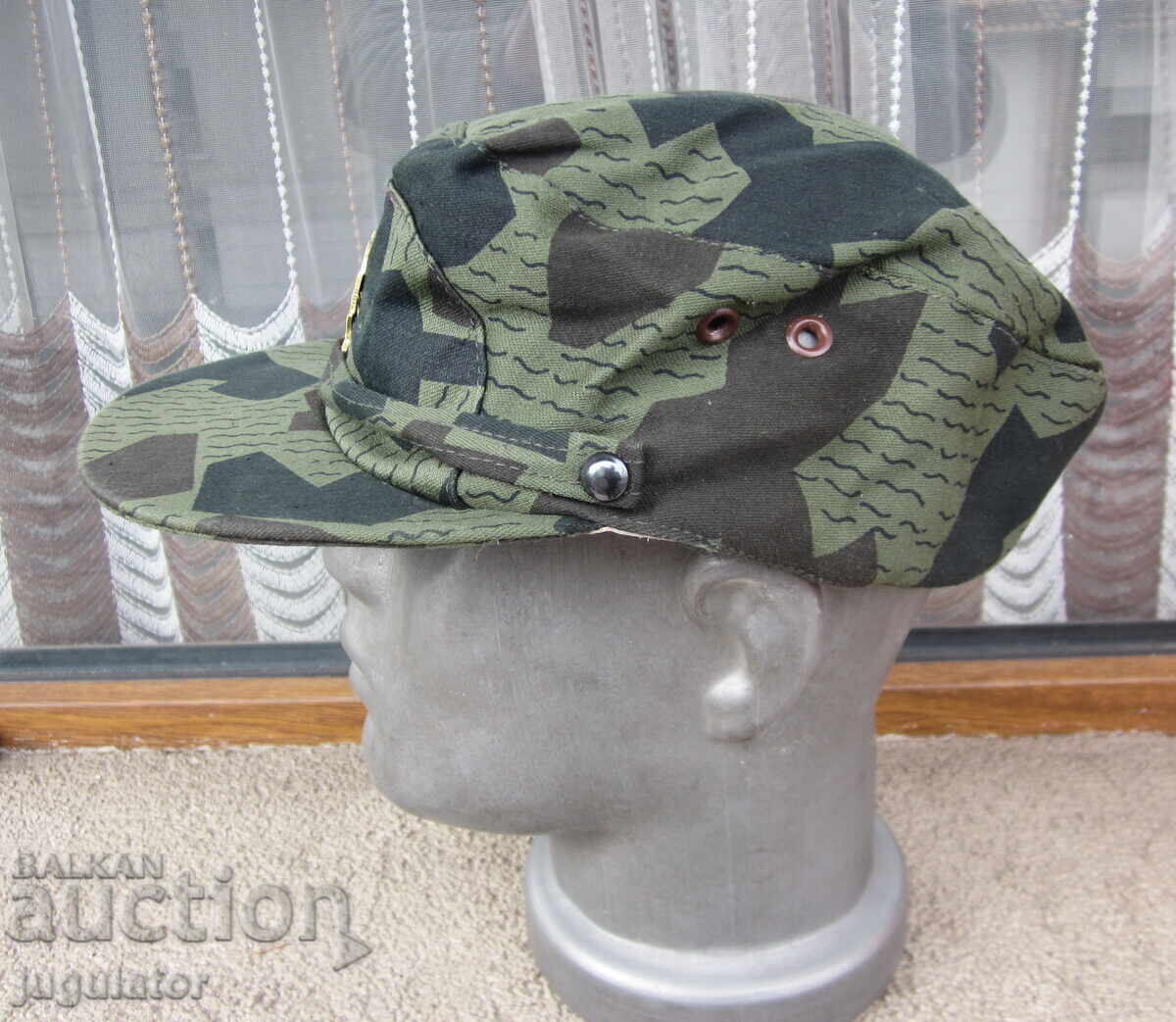 Auction  Bulgarian military officer's camouflage hat with a cockade