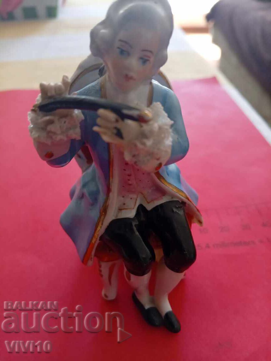 Antique porcelain figure, marked