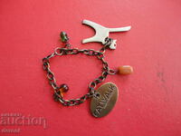 Бронзов аксесоар за чанта