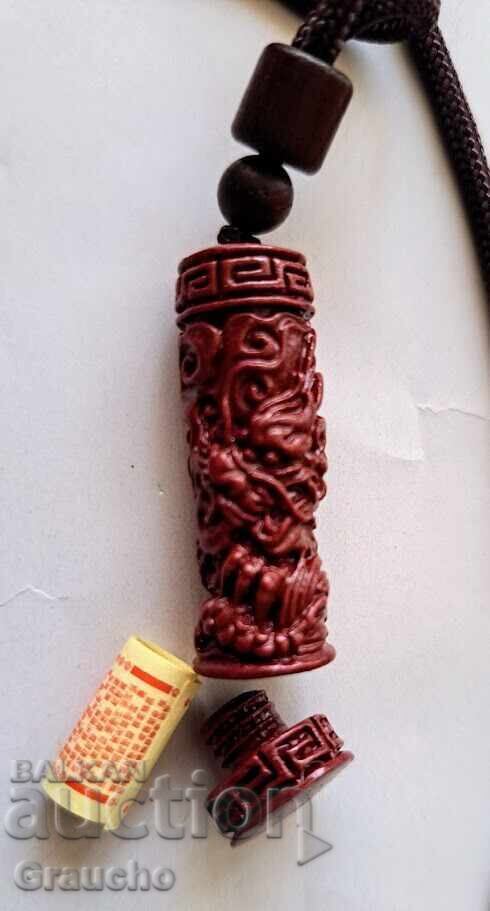 Cinnabar amulet pendant with a secret compartment Cinnabar amulet pendant with a secret compartment