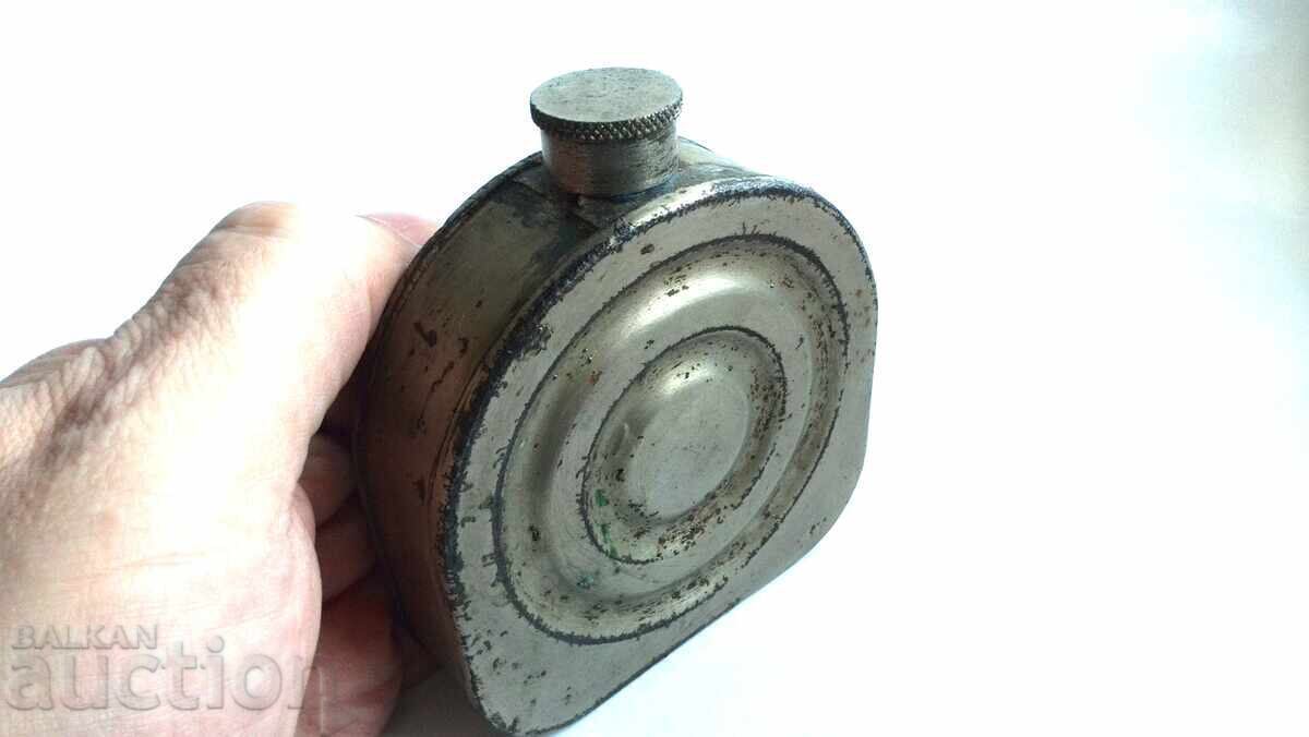 Auction  Old bottle or container for motor oil