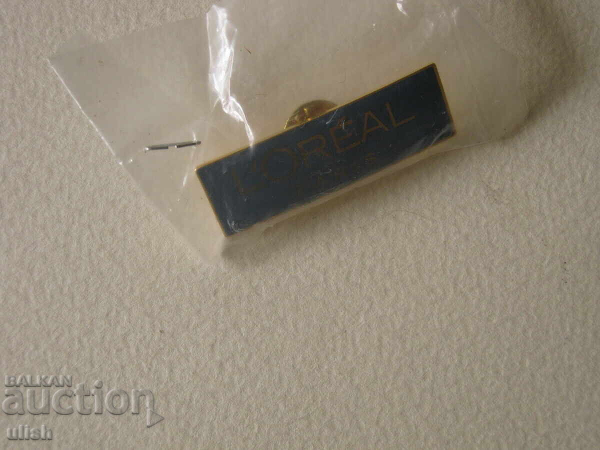 L'Oréal Paris znachok reklamna znachka эmal’