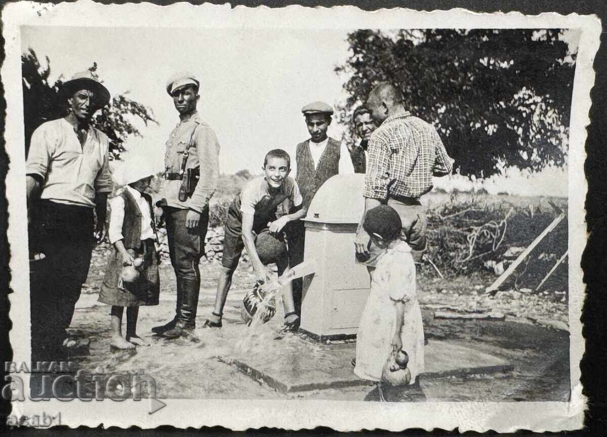 At the water fountain