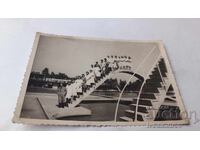 Photo Sofia Men and women on stairs of a swimming pool