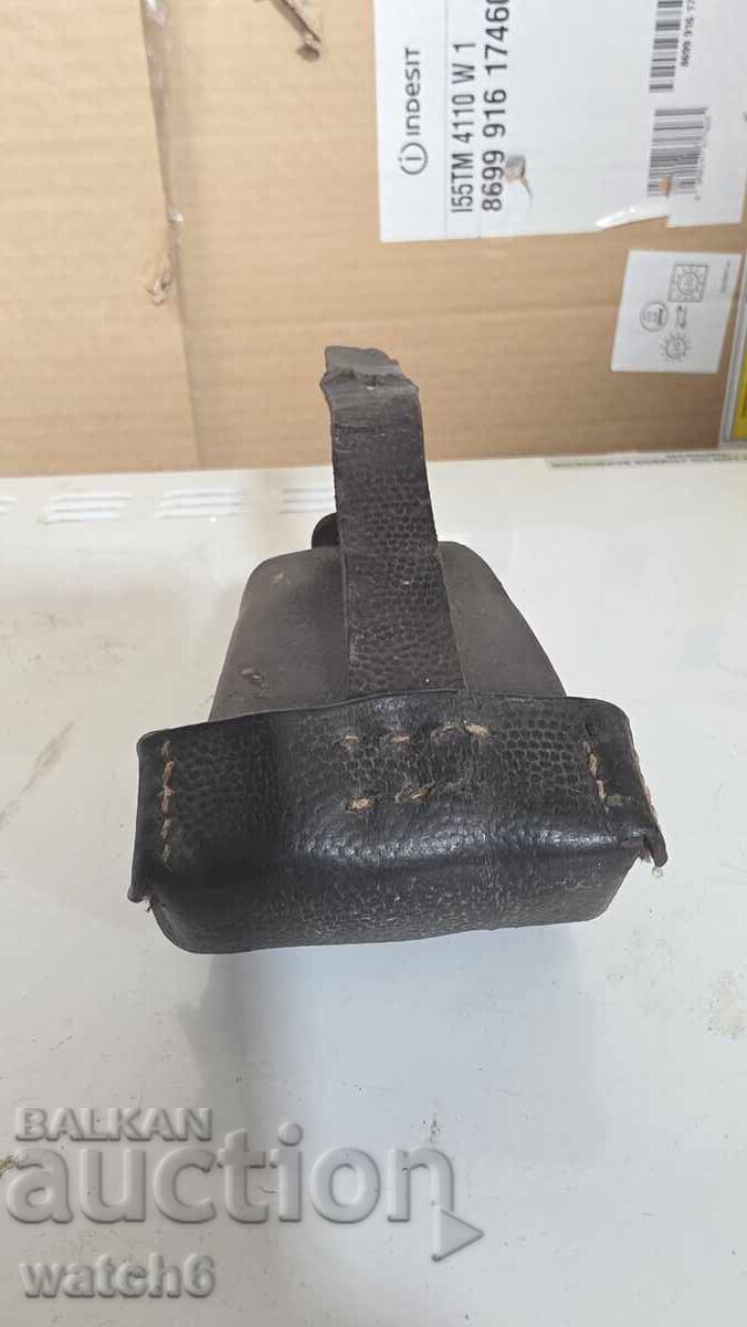 Auction  Small leather bag for a filler