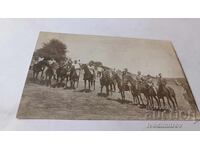 Fotografie Rakitovo Elevi de clasa a V-a și bărbați pe cai