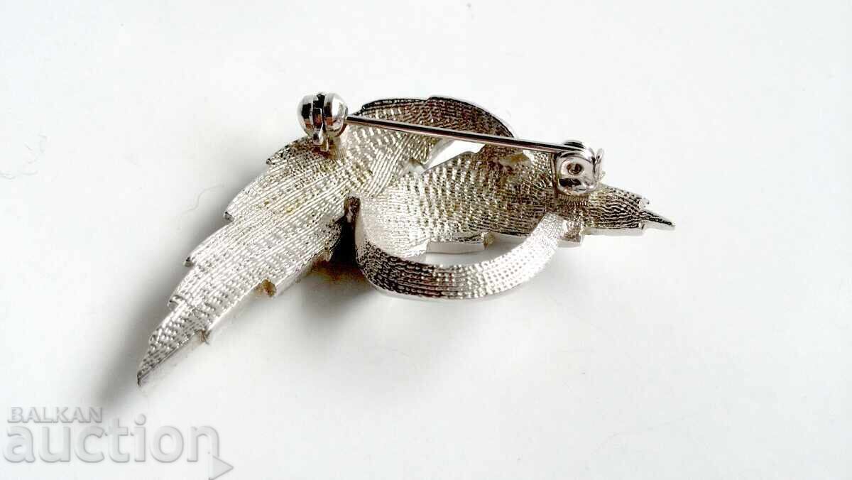 Auction  Old silver-plated brooch