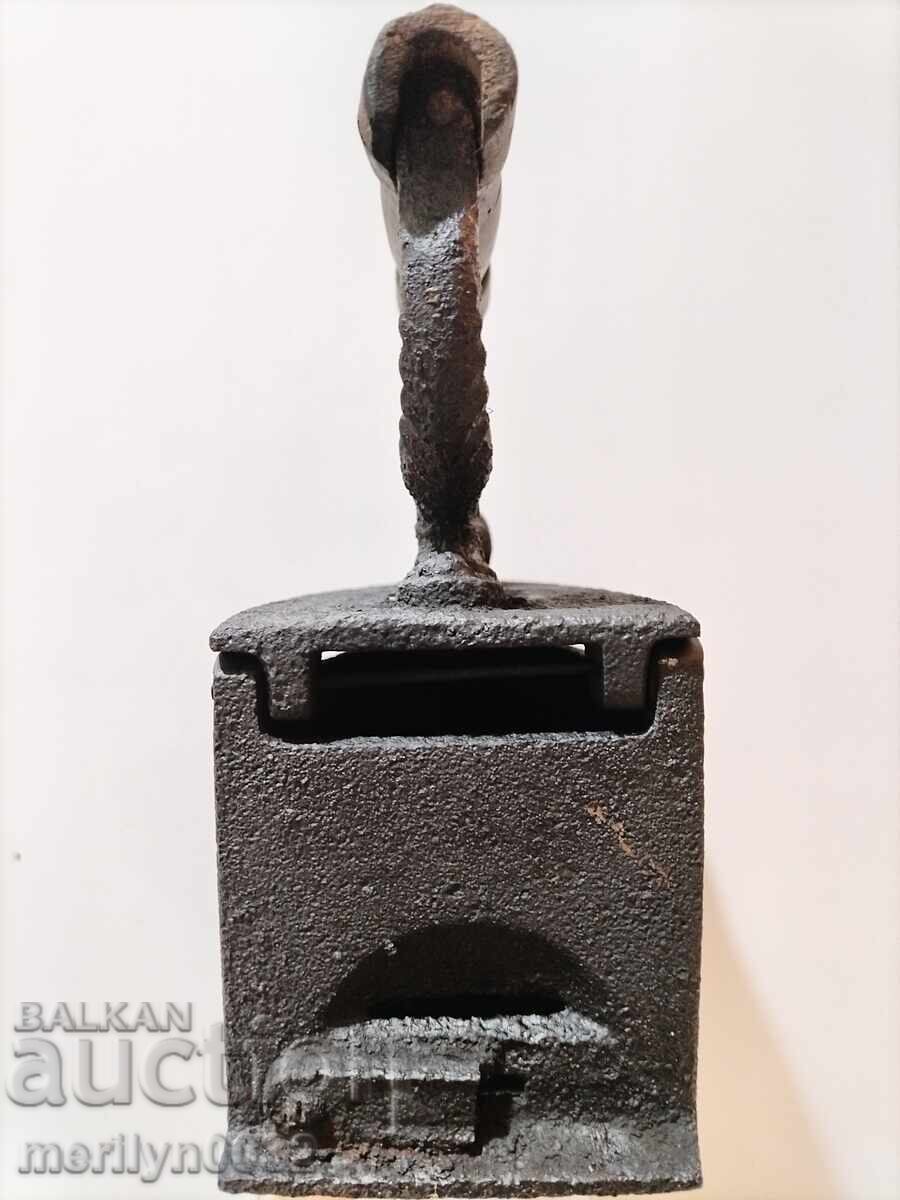 Auction An old iron on fire Auction An old iron on fire