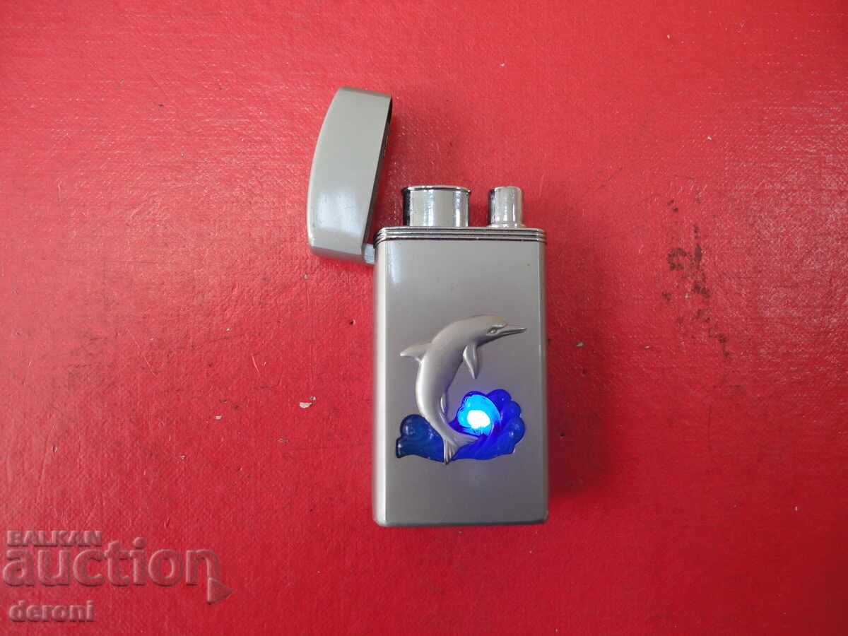 Auction  Great lighter with a Dolphin 1