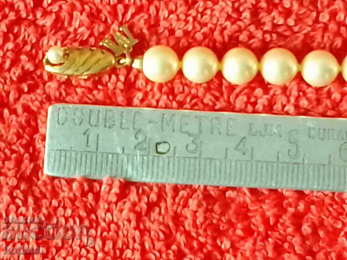 Brățară veche de argint cu perle cu preț 155.50 BGN | € 79.51