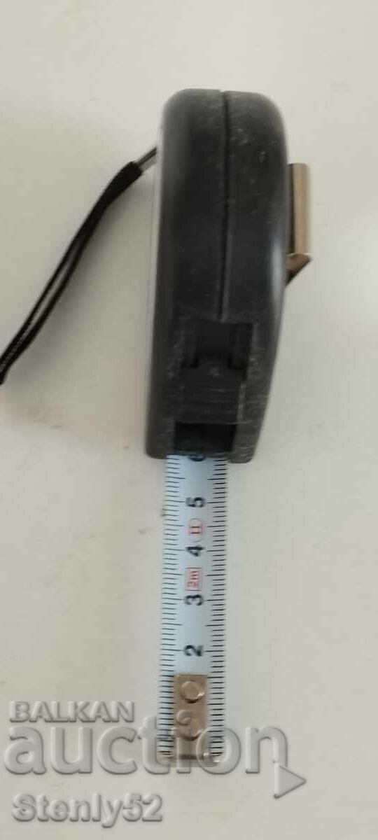 New, unused measuring tape - 2 meters