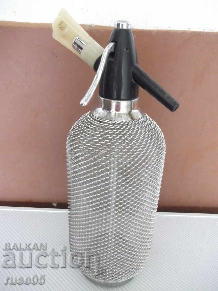 Шише за газирана вода ( сода ) с метална оплетка с цена 40.00 лв. | € 20.45 Шише за газирана вода ( сода ) с метална оплетка с цена 40.00 лв. | € 20.45