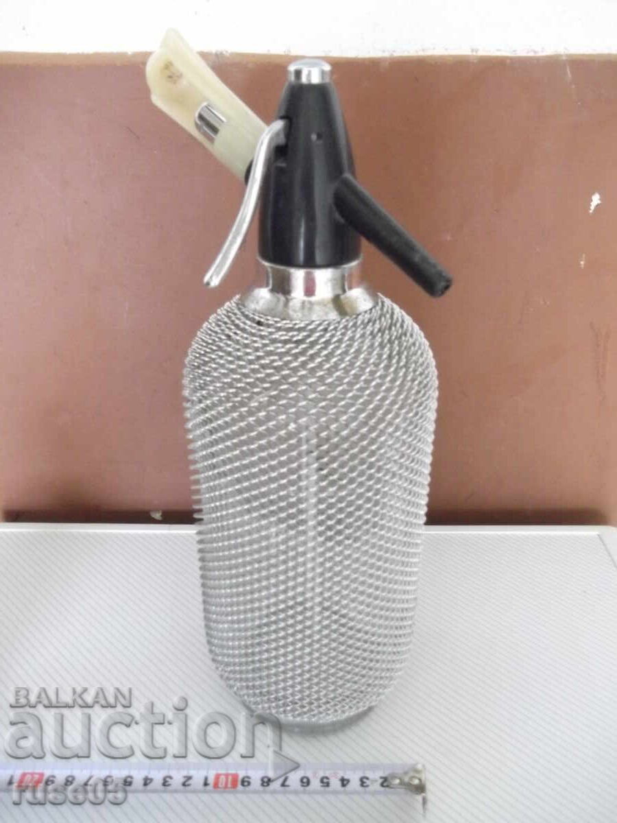 Аукцион Шише за газирана вода ( сода ) с метална оплетка Аукцион Шише за газирана вода ( сода ) с метална оплетка