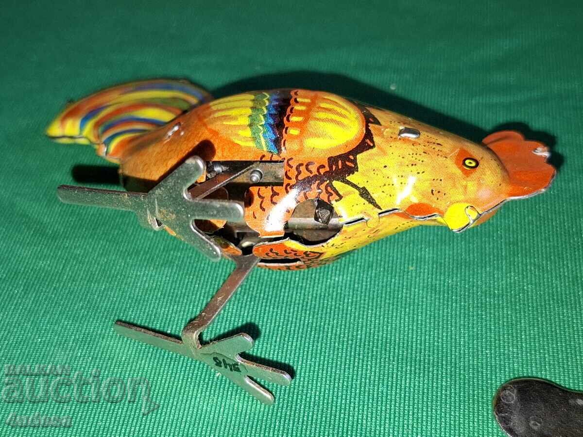 Доставка на 2 стари руски механични ламаринени играчки Петел и Кокошка