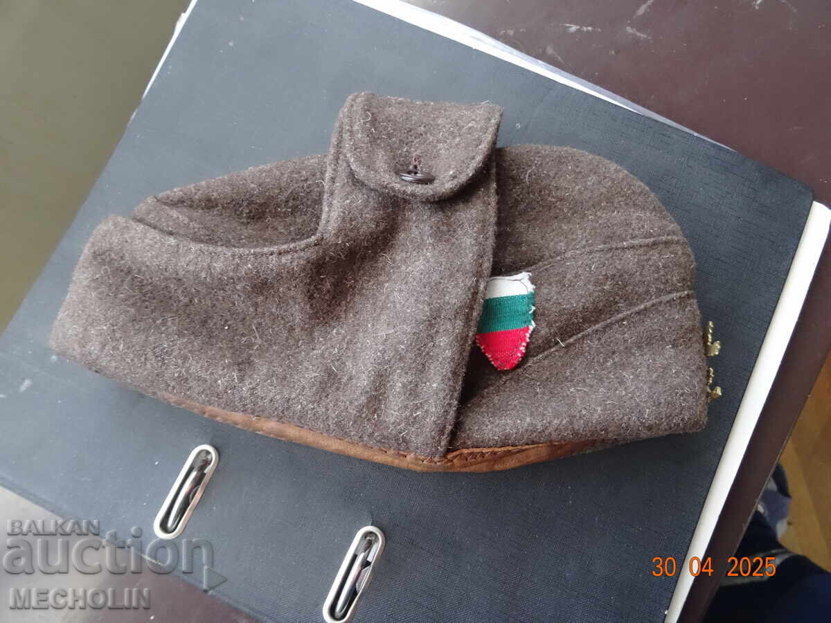 Delivery of Soldier's Winter Cap With Lion