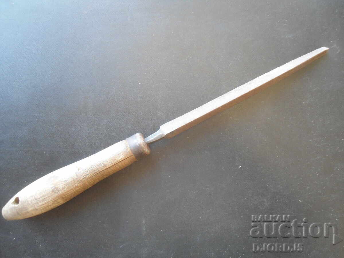 Old hacksaw, triangular