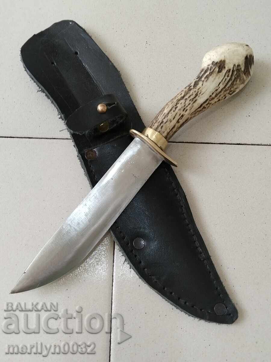 Hunting knife with a deer antler handle