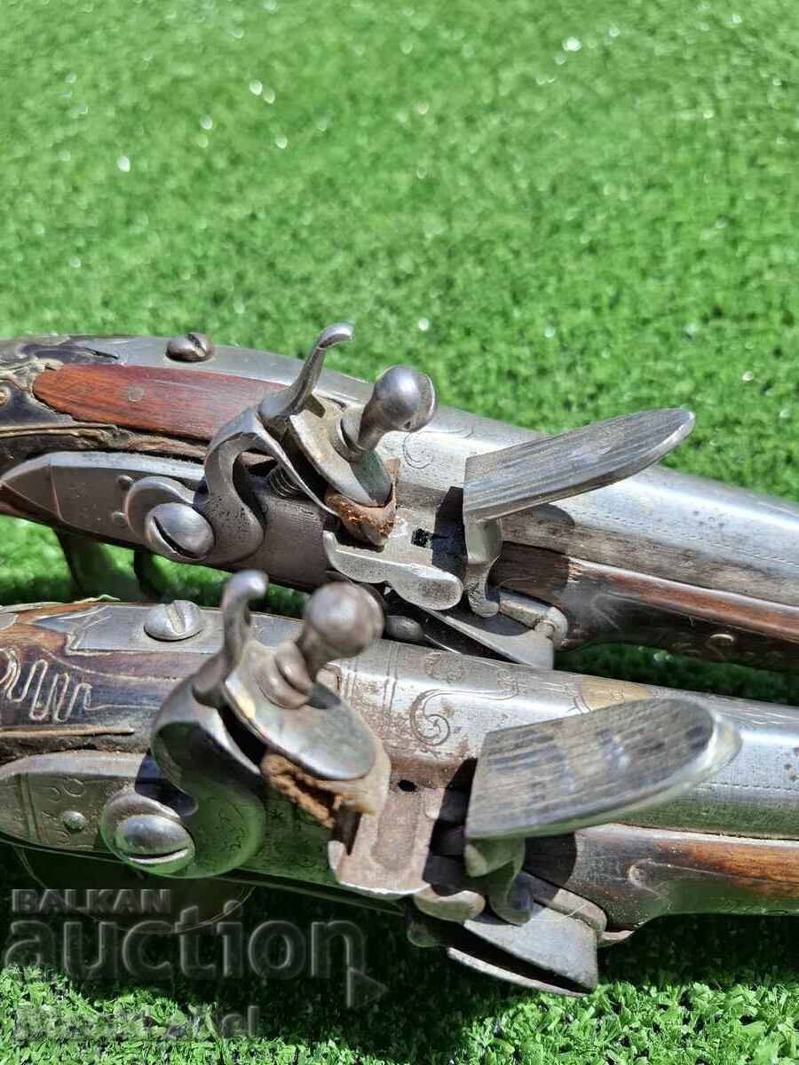 A pair of flintlocks with price 2300.00 BGN | € 1175.97 A pair of flintlocks with price 2300.00 BGN | € 1175.97