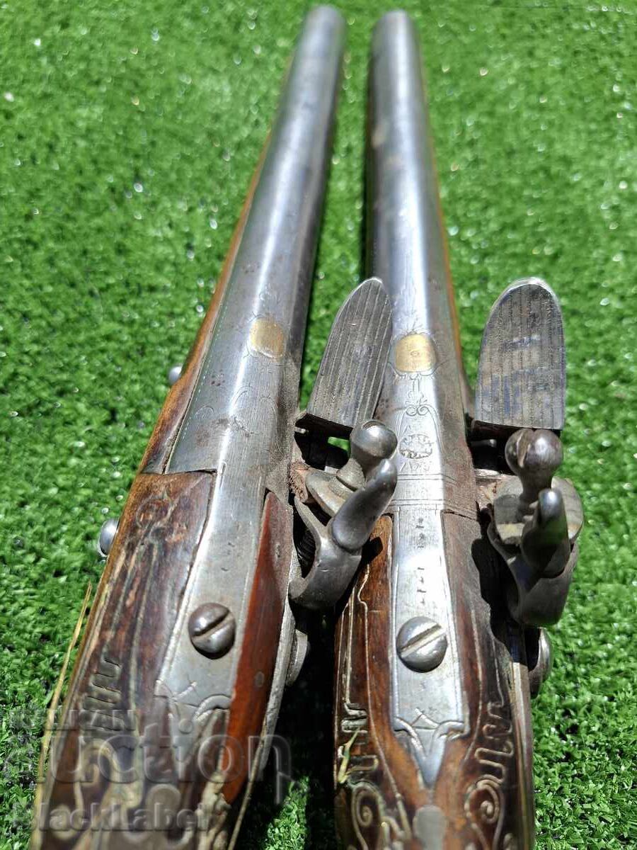 Auction A pair of flintlocks Auction A pair of flintlocks
