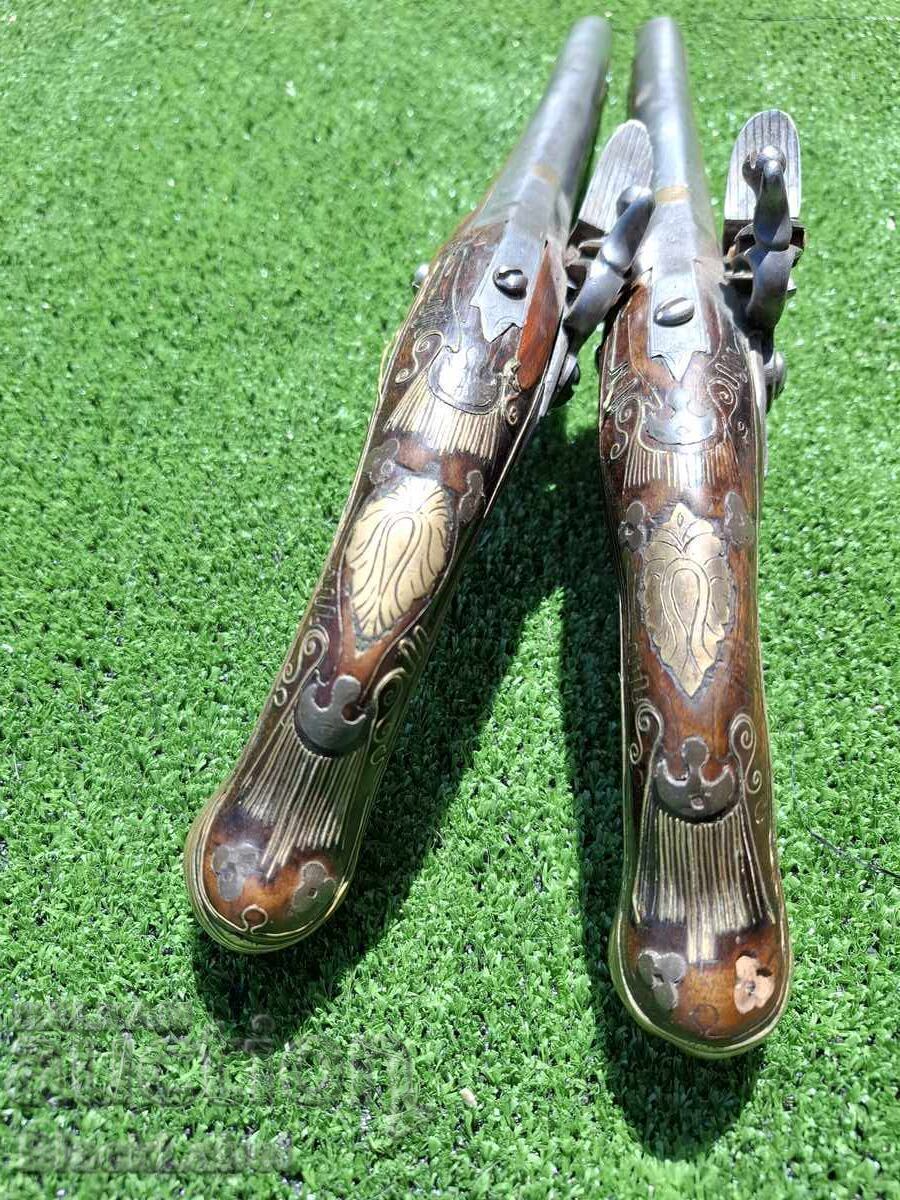 Delivery of A pair of flintlocks Delivery of A pair of flintlocks