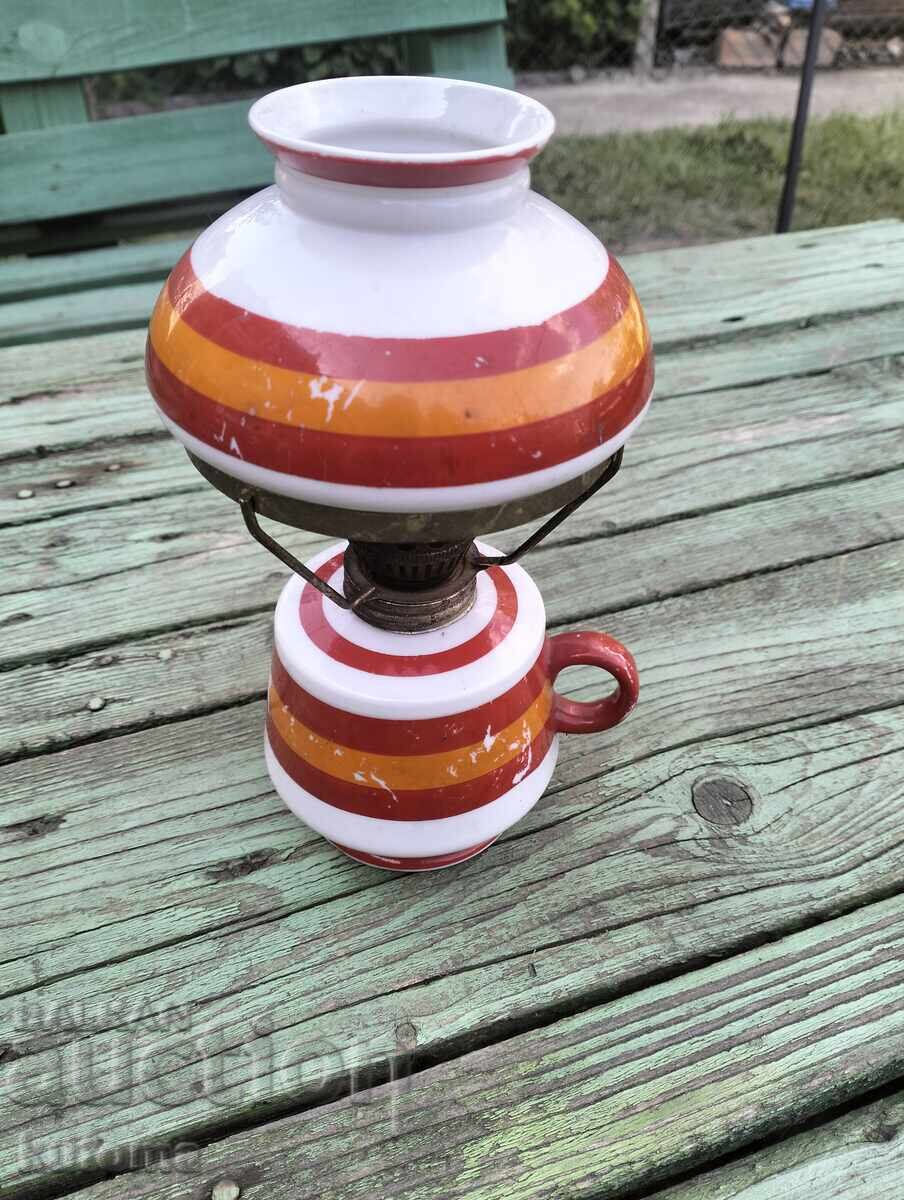 Old porcelain kerosene lamp