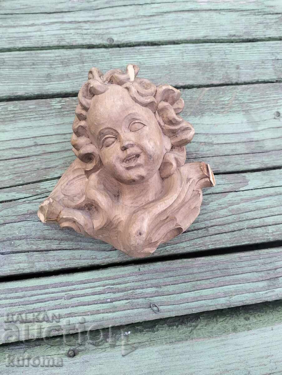 Дървена ангелска глава