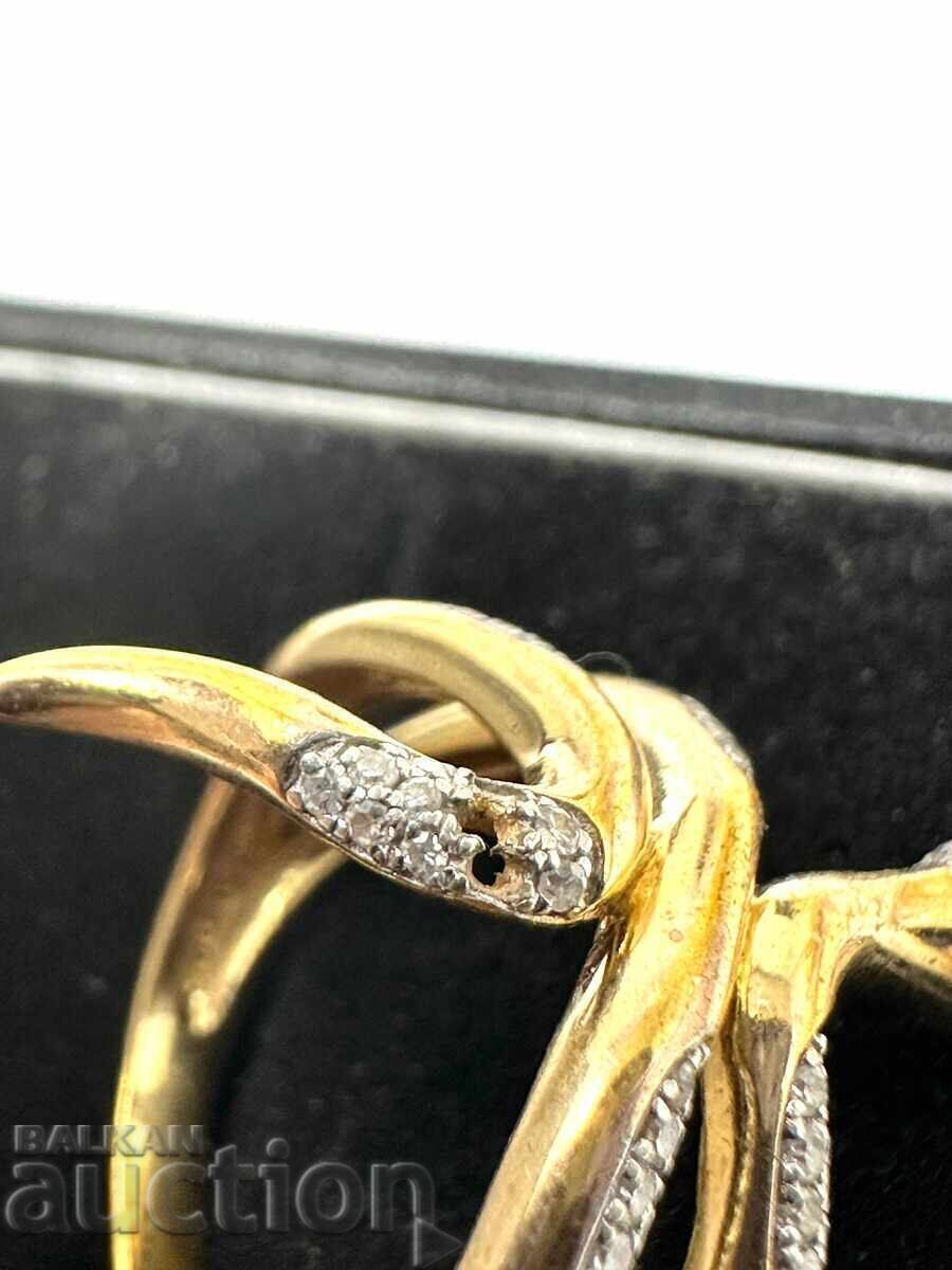 Delivery of Snake ring in silver and gold with diamonds and ruby eyes!