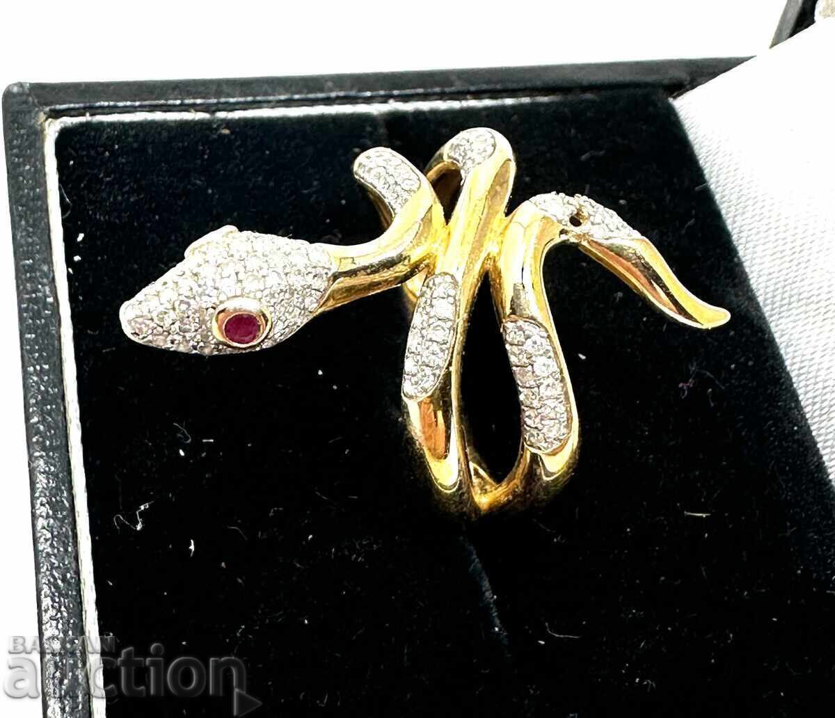 Snake ring in silver and gold with diamonds and ruby eyes!