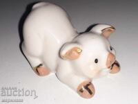 SMALL FIGURE. PORCELAIN, GOLD PLATING