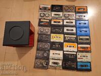 32 audio cassettes in a carousel rack