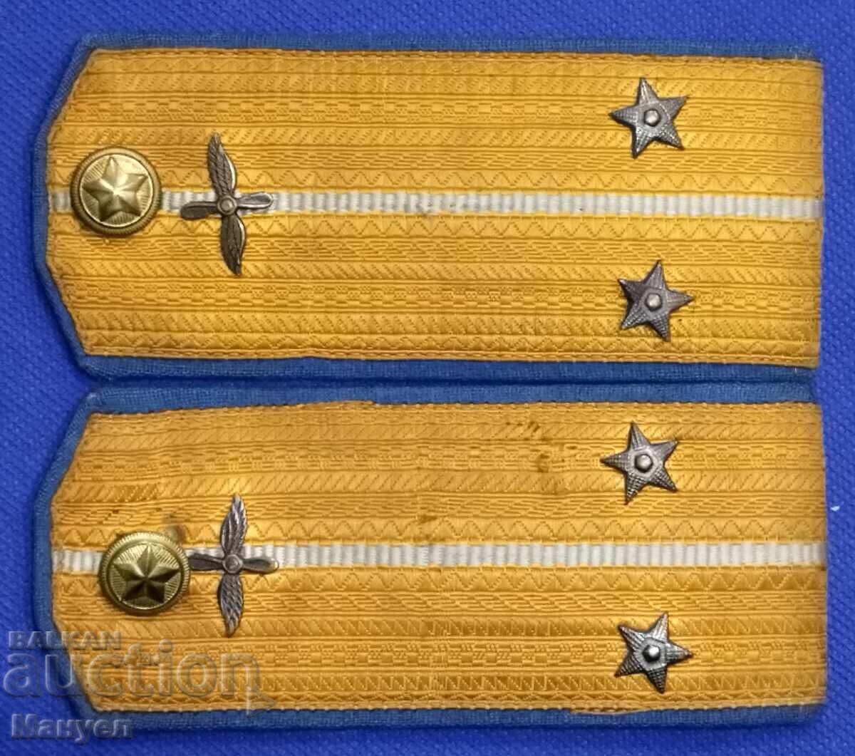 Selling old military shoulder boards. Early socialist air force