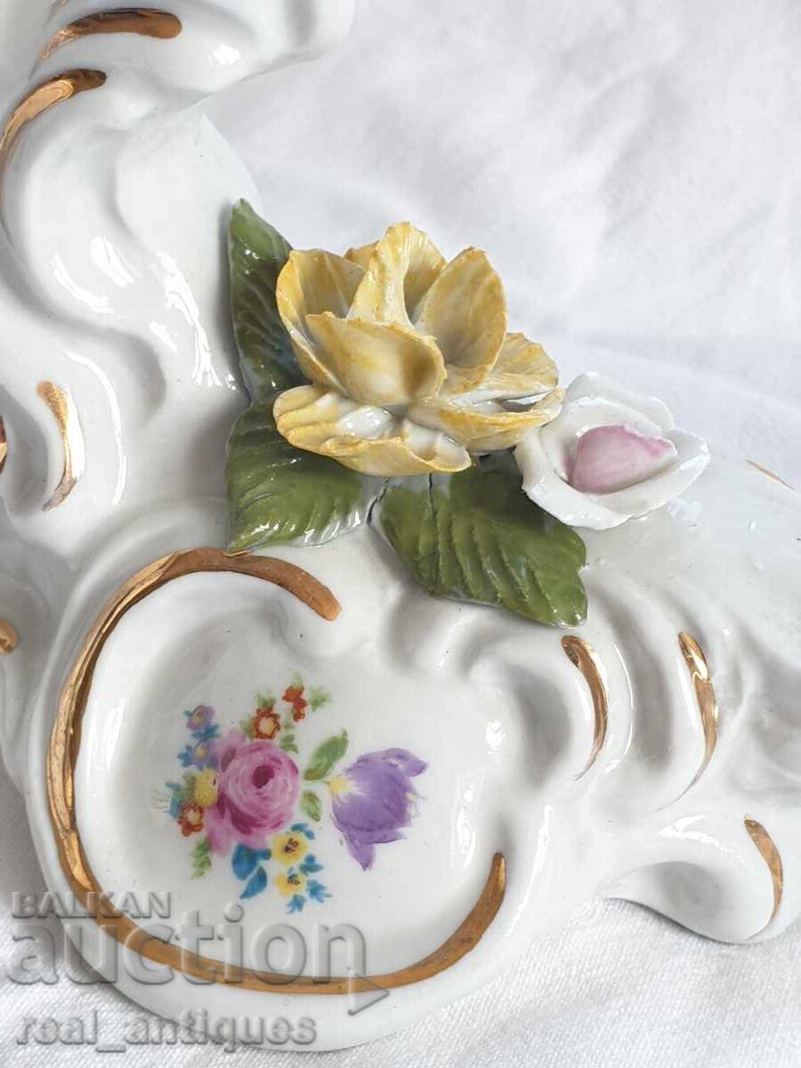 Auction  Set of porcelain candlesticks