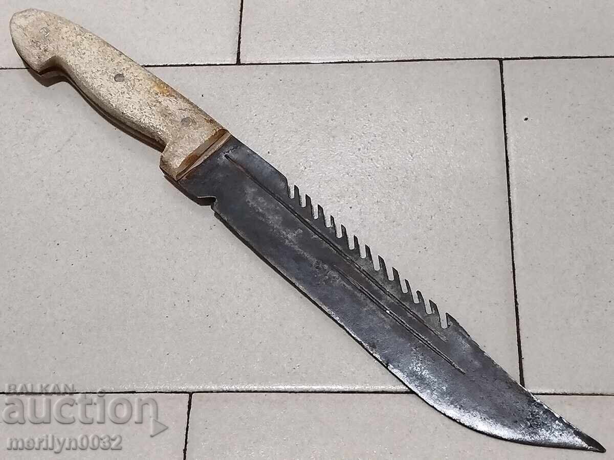 Old knife without a sheath, with teeth Old knife without a sheath, with teeth