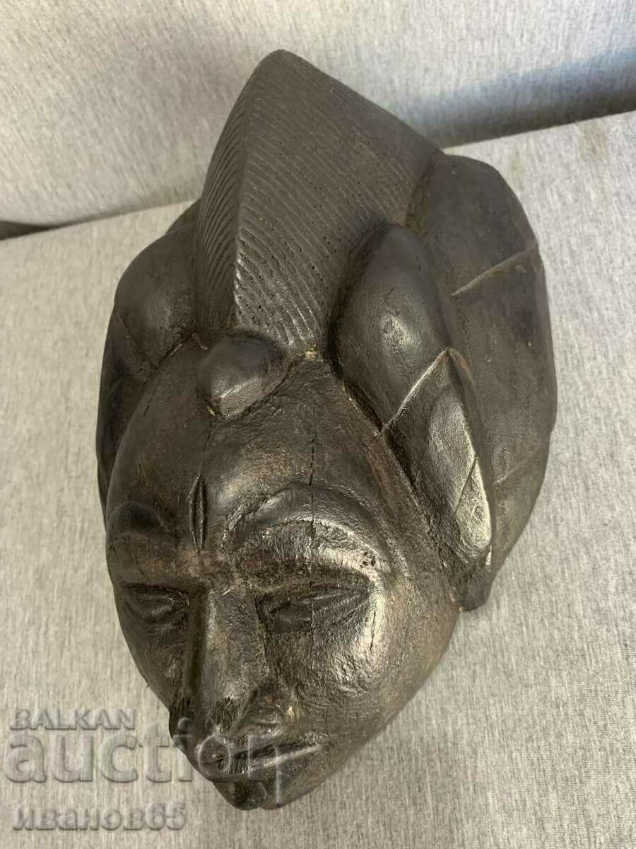 Auction wooden African mask Auction wooden African mask