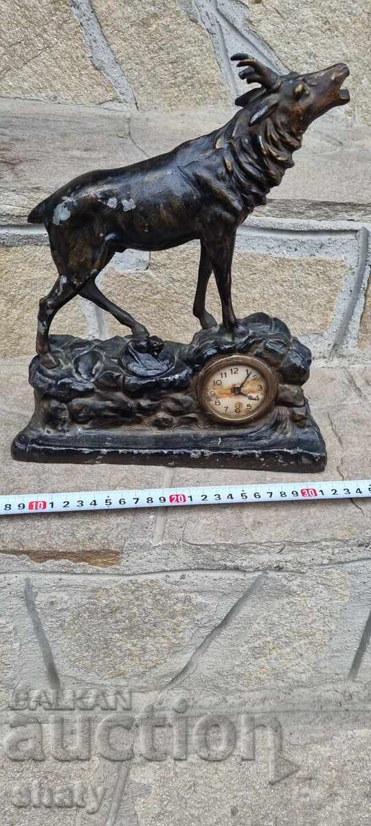 Old sculpture, figure of a deer. Clock. Inkwell Old sculpture, figure of a deer. Clock. Inkwell