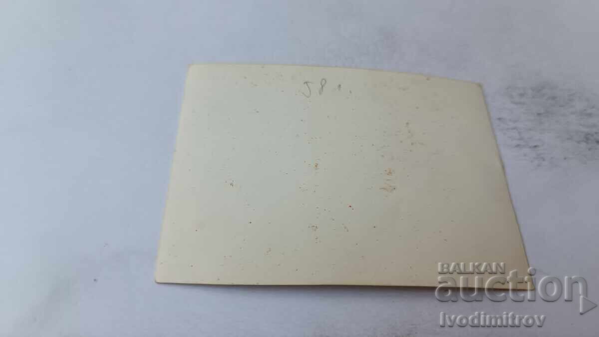 Φωτογραφία Άνδρας γυναίκα και δύο νέοι με μαγιό με τιμή 1.65 BGN | € 0.84