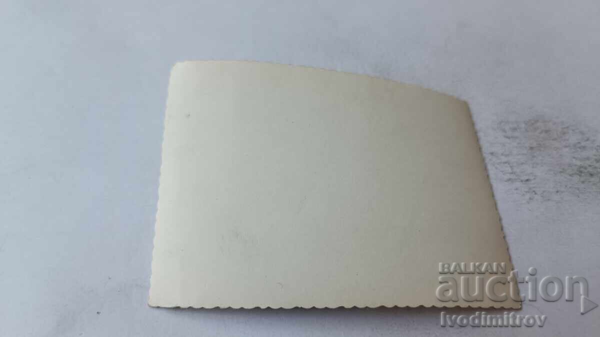 Fotografie cu un bărbat, două femei și un băiețel pe plajă cu preț 1.65 BGN | € 0.84