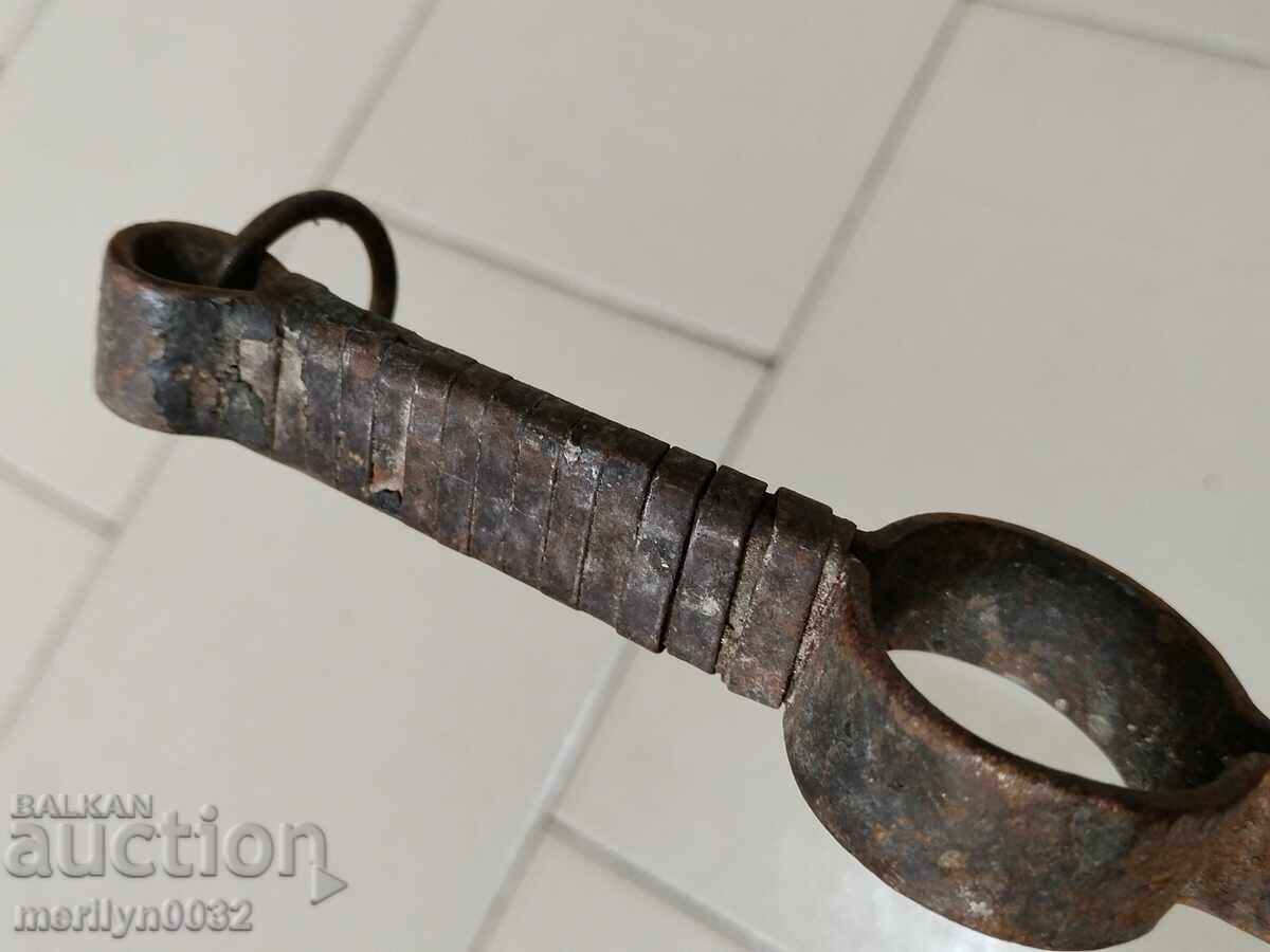 Delivery of Old tongs, dilaf, wrought iron Delivery of Old tongs, dilaf, wrought iron