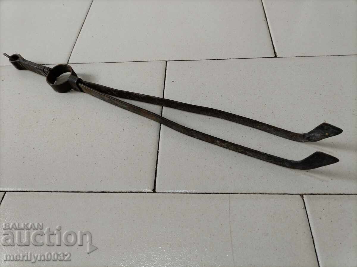 Old tongs, dilaf, wrought iron Old tongs, dilaf, wrought iron