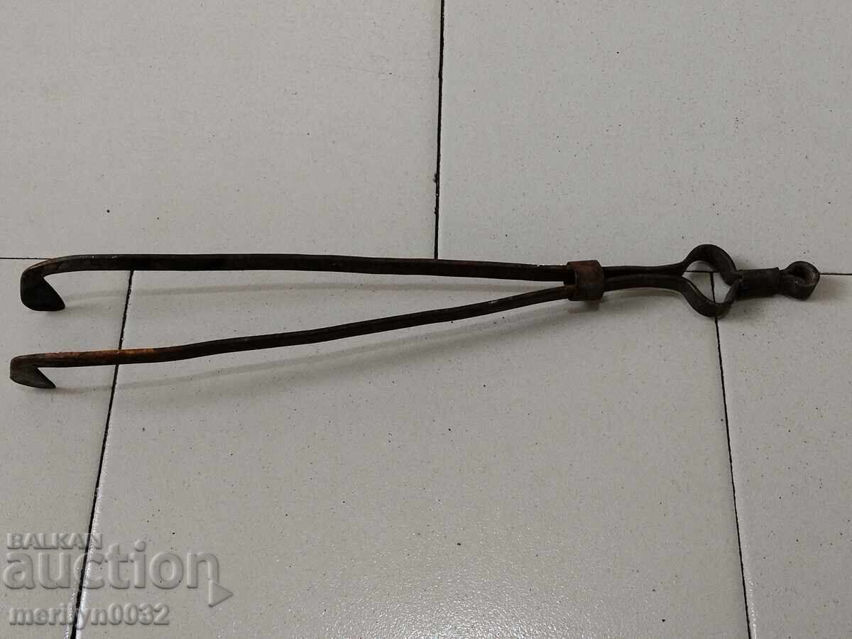 Auction Old tongs, dilaf, wrought iron Auction Old tongs, dilaf, wrought iron