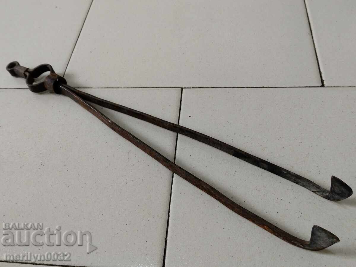Old tongs, dilaf, wrought iron Old tongs, dilaf, wrought iron
