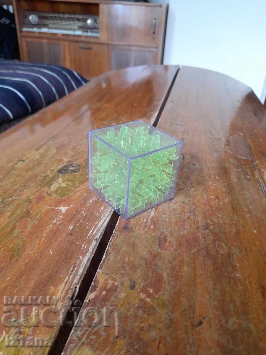 Old toy maze cube