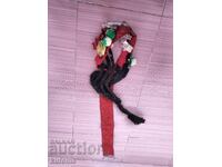 Old authentic sickle for folk costume