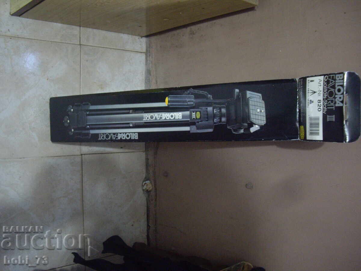 Παράδοση Ολοκαίνουργιο τρίποδο φωτογραφικής μηχανής