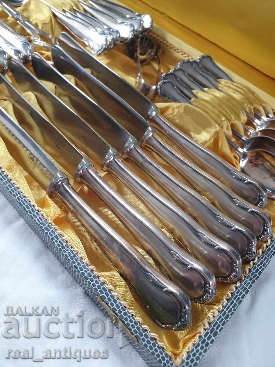 Auction  Set of silver plated utensils