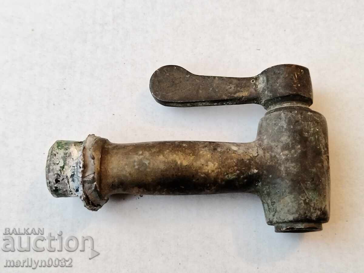 Old bronze faucet key tap valve spigot