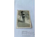 Foto Fată tânără pe plajă