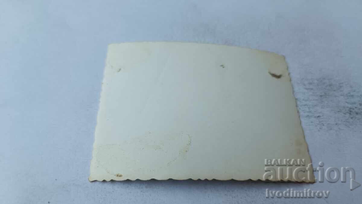 Photo of Young Men and Women with a Water Wheel in the Sea with price 1.65 BGN | € 0.84